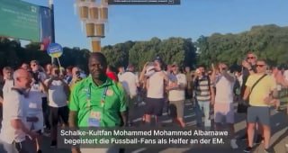 Kultfan „Momo“ begeistert EM-Publikum mit Bier-Balance-Künsten