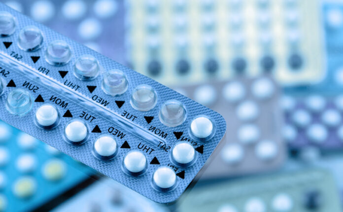 Oral,Contraceptive,Pill,On,Pharmacy,Counter,With,Colorful,Pills,Strips